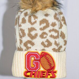 Leopard print stocking cap with K C Chiefs football patch
